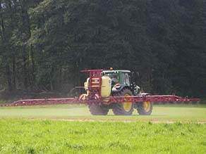 Tractor sprays pesticides