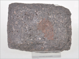 Ein handgroßes Stück Felsen