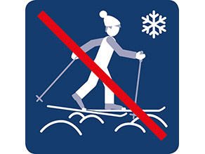 Langläufer mit Wintersymbol, durchgestrichen.